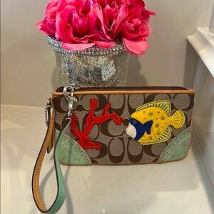 Coach limited edition signature appliqué embroidered fish wristlet, EUC